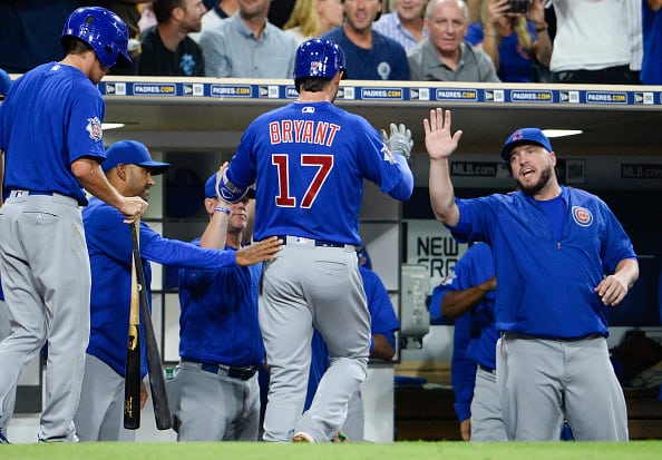 SAN DIEGO, CALIFORNIA - AUGUST 23:  Kris Bryant #17 of the Chicago Cubs is congratulated after hitting a solo home run during the third inning of a baseball game against the San Diego Padres at PETCO Park on August 23, 2016 in San Diego, California.  (Photo by Denis Poroy/Getty Images)